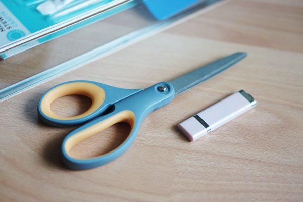 scissors and thumb drive